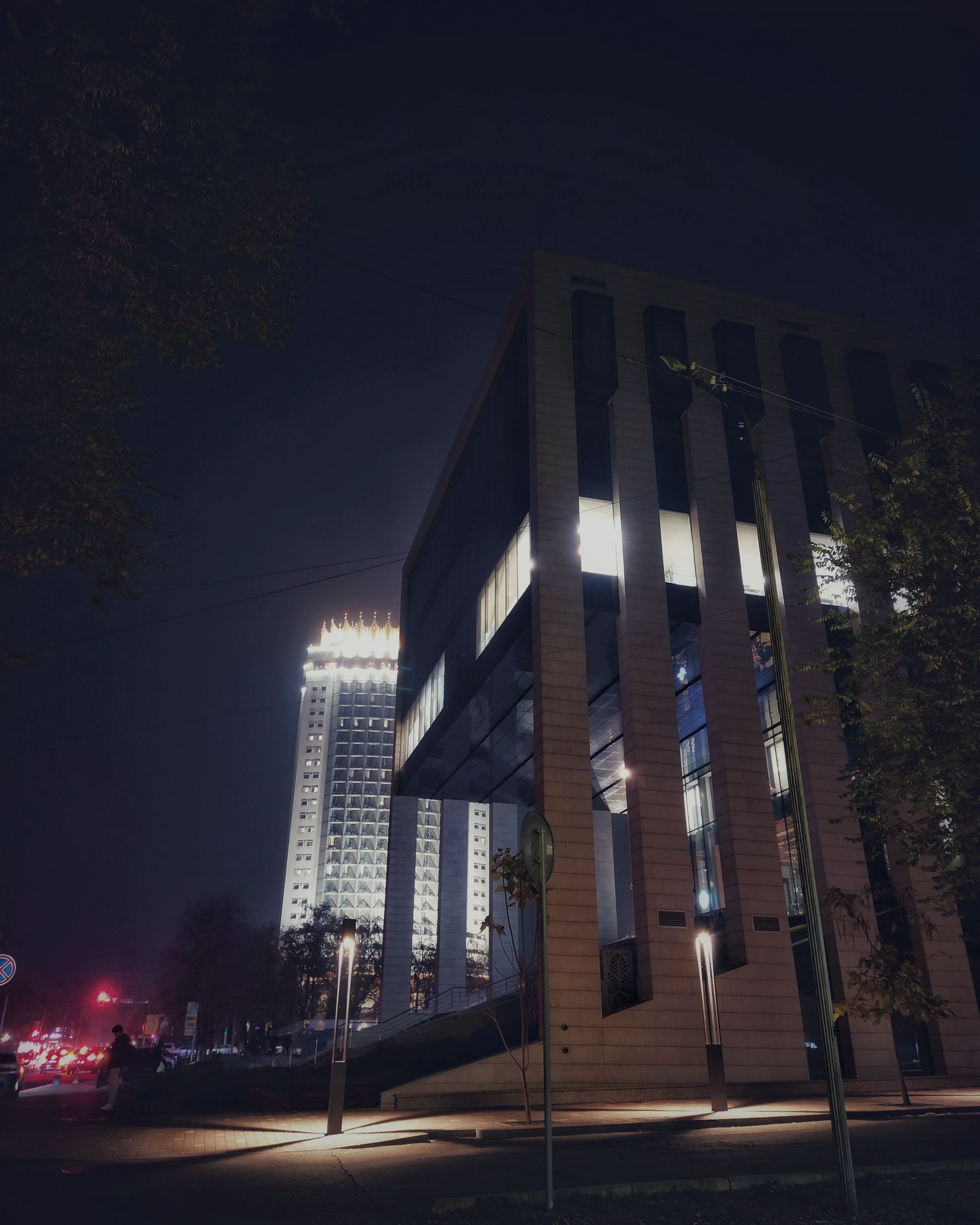 Modern geometric architecture at night