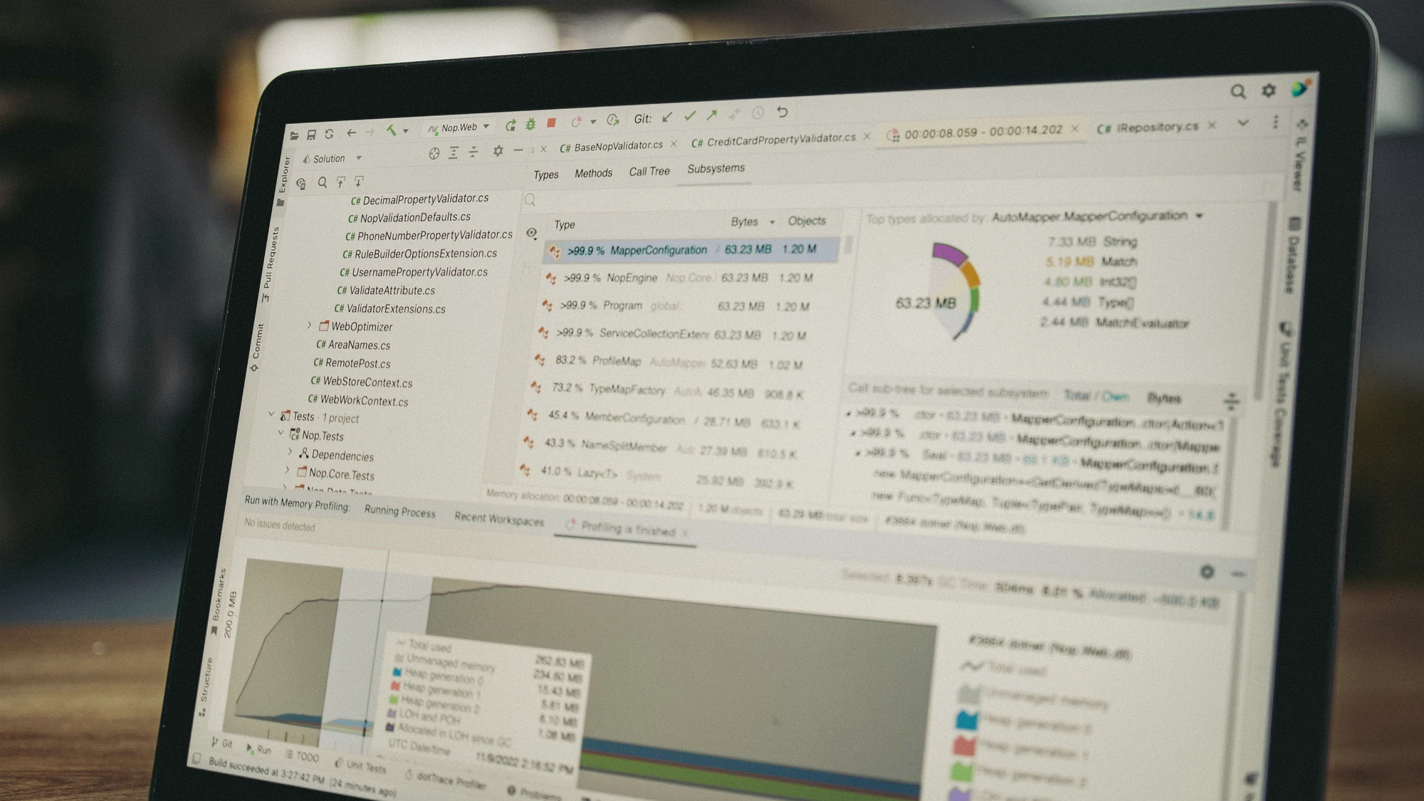 Laptop displaying coding and data-analysis tools for a data quality workspace