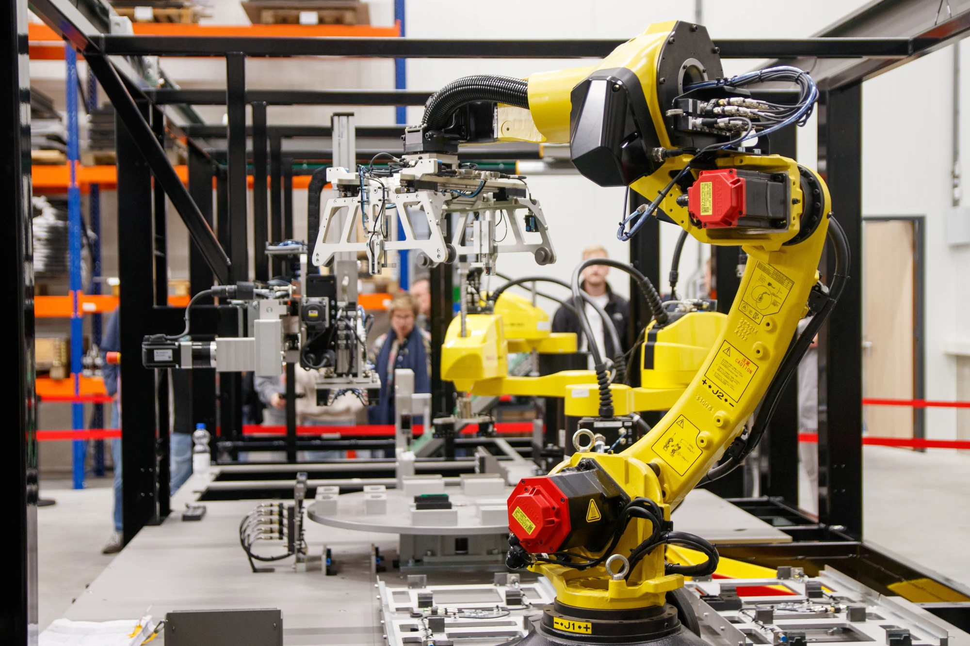 Industrial robot operating in a real manufacturing facility